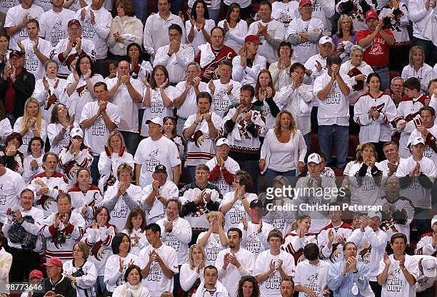 Fans of the Phoenix Coyotes cheer in Game One of the Western Conference Quarterfinals against the Detroit Red Wings during the 2010 NHL Stanley Cup...