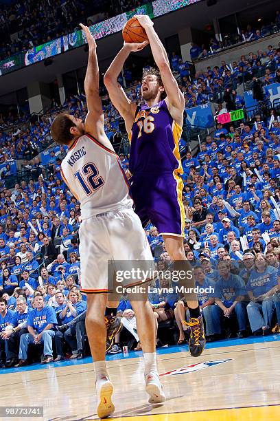 Pau Gasol of the Los Angeles Lakers shoots a jump shot over Nenad Krstic of the Oklahoma City Thunder in Game Six of the Western Conference...