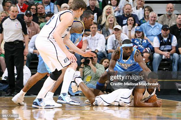 Ronnie Price of the Utah Jazz goes after the loose ball against Ty Lawson of the Denver Nuggets in Game Six of the Western Conference Quarterfinals...