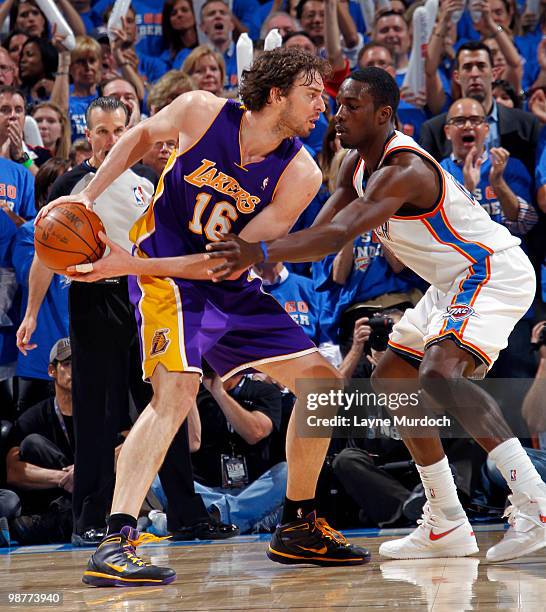 Pau Gasol of the Los Angeles Lakers looks to drive to the basket while being guarded by Jeff Green of the Oklahoma City Thunder in Game Six of the...