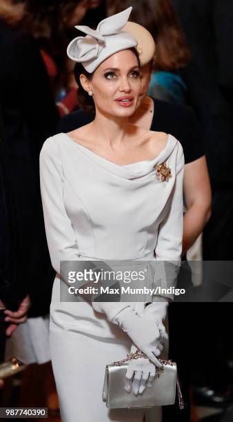 Angelina Jolie, an Honorary Dame Commander of The Most Distinguished Order of Saint Michael and Saint George, attends a Service of Commemoration and...