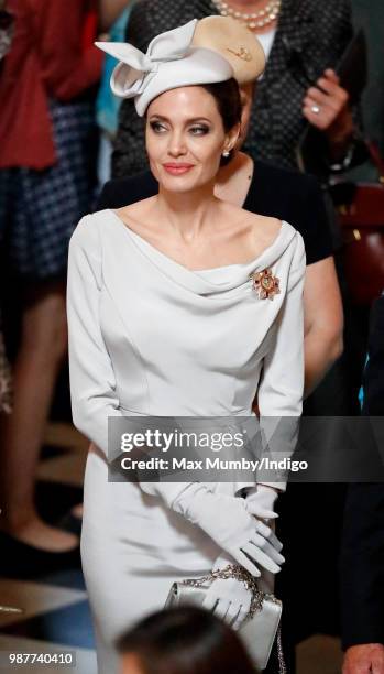 Angelina Jolie, an Honorary Dame Commander of The Most Distinguished Order of Saint Michael and Saint George, attends a Service of Commemoration and...