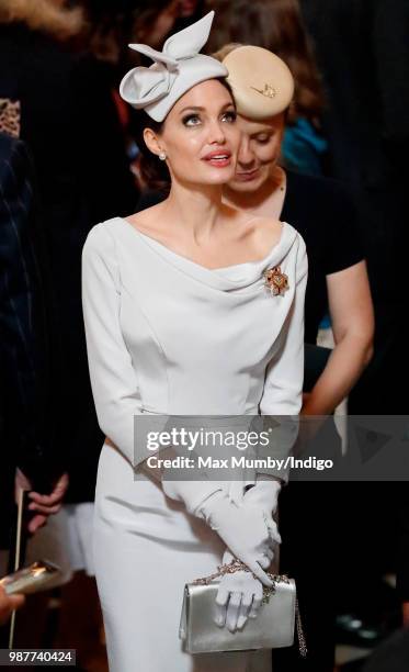 Angelina Jolie, an Honorary Dame Commander of The Most Distinguished Order of Saint Michael and Saint George, attends a Service of Commemoration and...