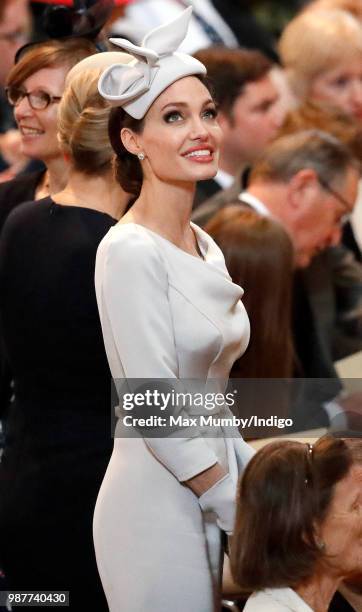 Angelina Jolie, an Honorary Dame Commander of The Most Distinguished Order of Saint Michael and Saint George, attends a Service of Commemoration and...