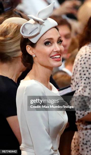 Angelina Jolie, an Honorary Dame Commander of The Most Distinguished Order of Saint Michael and Saint George, attends a Service of Commemoration and...