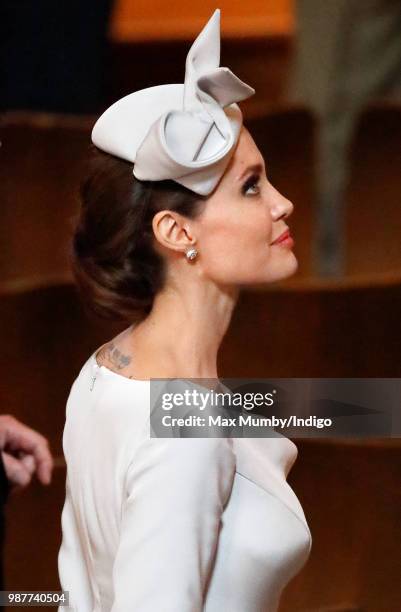 Angelina Jolie, an Honorary Dame Commander of The Most Distinguished Order of Saint Michael and Saint George, attends a Service of Commemoration and...