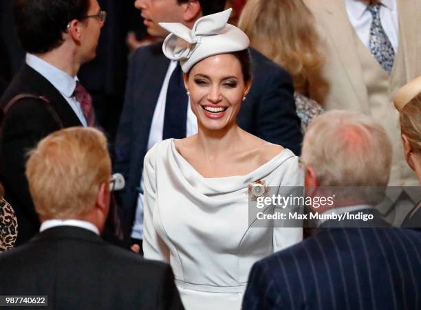 Angelina Jolie, an Honorary Dame Commander of The Most Distinguished Order of Saint Michael and Saint George, attends a Service of Commemoration and...