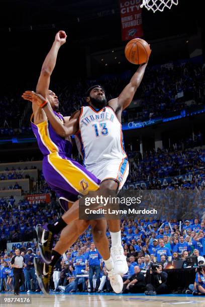 James Harden of the Oklahoma City Thunder goes to the basket against Shannon Brown of the Los Angeles Lakers in Game Six of the Western Conference...