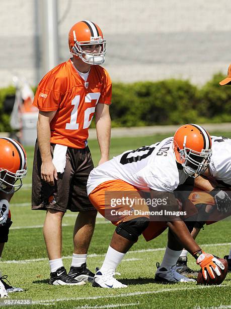 Quarterback Colt McCoy of the Cleveland Browns looks over the defense as center Daverin Gernalds waits to snap the ball during the team's rookie and...