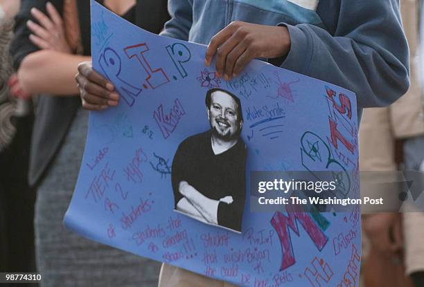 Students, teachers, family and friends attend the wake for Shaw at Garnet-Patterson Middle School principal Brian Betts who was slain in his Silver...