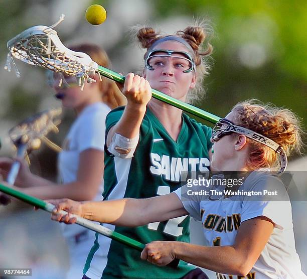 April 30: Saints Reilly Woodman has her pas disruted by Valley's Andrea Mustacchio during Saint Stephens and Saint Agnes Saints defeat of the Loudoun...