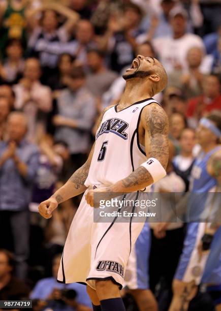 Carlos Boozer of the Utah Jazz celebrates after the Jazz went ahead 76-75 in the third period of their game against the Denver Nuggets during Game...