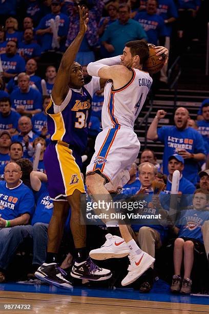 Ron Artest of the Los Angeles Lakers defends against Nick Collison of the Oklahoma City Thunder during Game Six of the Western Conference...