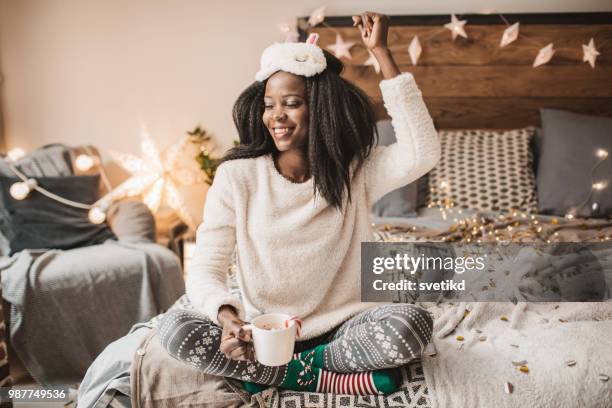 holiday pajama party - pajamas stock pictures, royalty-free photos & images