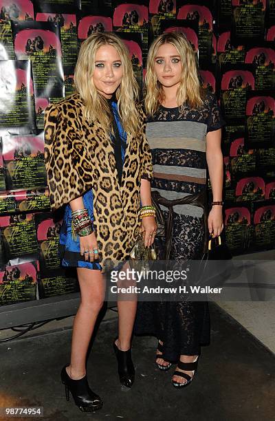 Actors Mary-Kate Olsen and Ashley Olsen attend Art of Elysium "Bright Lights" with VERSUS by Donatella Versace and Christopher Kane at Milk Studios...