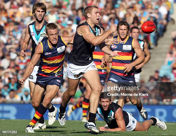 Kane Cornes of the Power passes the ball during the round six AFL match between the Adelaide Crows and the Port Adelaide Power at AAMI Stadium on May...