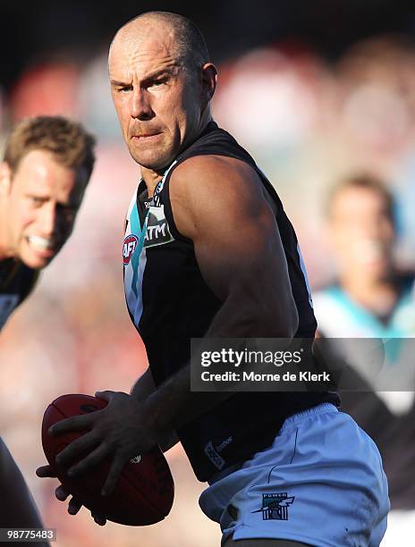 Warren Tredrea of the Power runs with the ball during the round six AFL match between the Adelaide Crows and the Port Adelaide Power at AAMI Stadium...