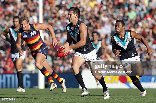 Steven Salopek of the Power runs with the ball during the round six AFL match between the Adelaide Crows and the Port Adelaide Power at AAMI Stadium...