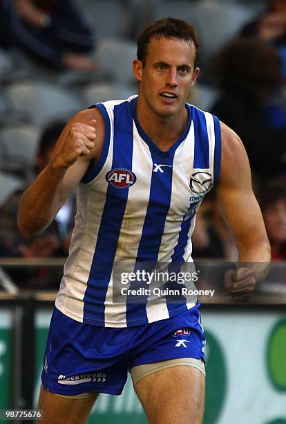 David Hale of the Kangaroos celebrates kicking a goal during the round six AFL match between the North Melbourne Kangaroos and the Melbourne Demons...