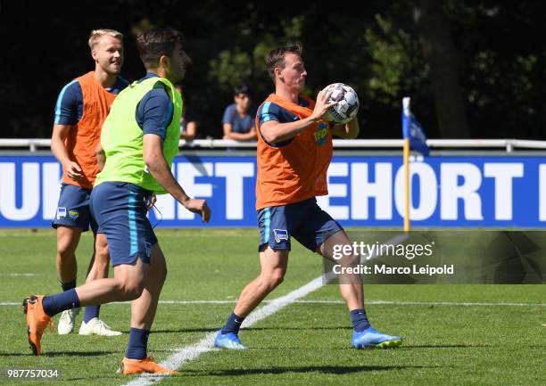 Pascal Koepke, Muhammed Kiprit and Vladimir Darida of Hertha BSC during the training at Schenkendorfplatz on June 30, 2018 in Berlin, Germany.