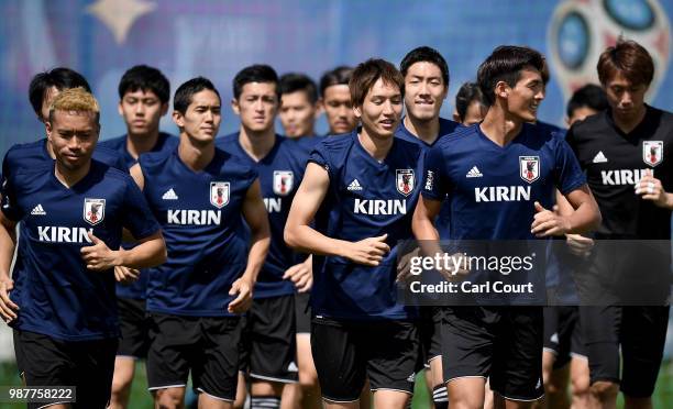 Japan players warm up during a training session at FC Rubin Kazan training ground on June 30, 2018 in Kazan, Russia.