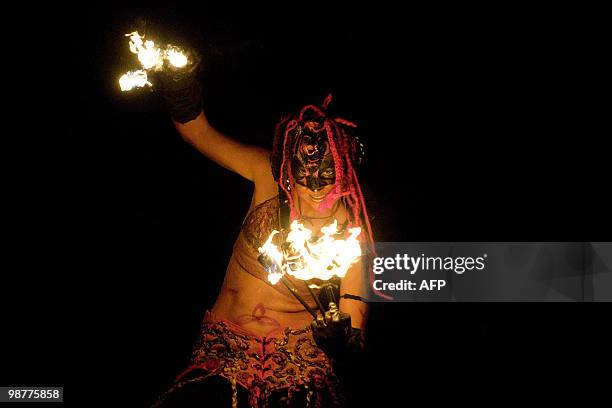 Woman performs during the Beltane Fire Festival in Edinburgh, on April 30, 2010. The event, which celebrates an ancient Celtic festival, is a...