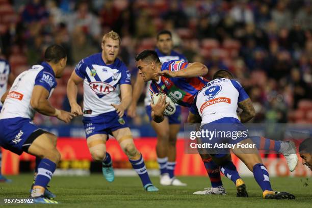 Herman Ese'ese of the Knights scores a try during the round 16 NRL match between the Newcastle Knights and the Canterbury Bulldogs at McDonald Jones...