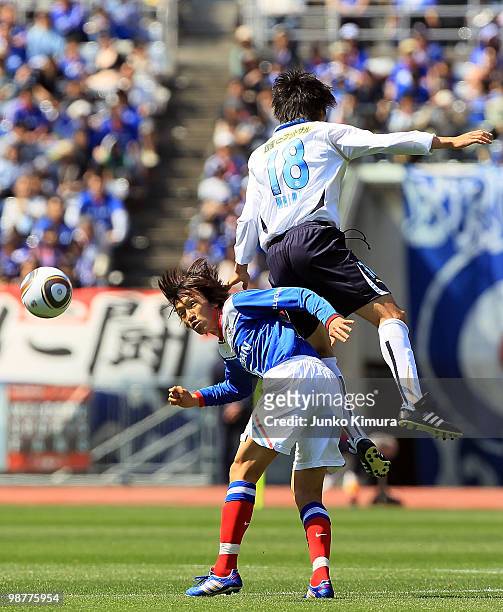 Shunsuke Nakamura of Yokohama F. Marinos and Ryoichi Maeda of Jubilo Iwata compete for the ball during the J. League match between Yokohama F....