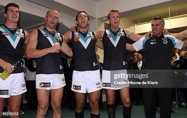 L-r Paul Stewart, Chad Cornes, Troy Chaplin, Dean Brogan, Mark Williams of the Power celebrate after winning during the round six AFL match between...