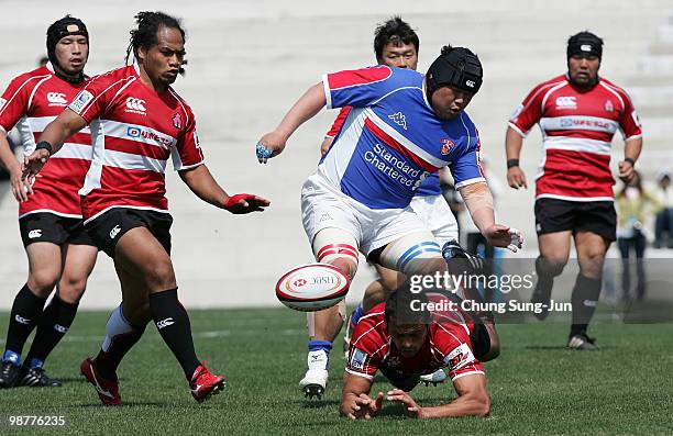 Ryan Nicholas of Japan celebrate with Sione Vatuvei after score a try during the Rugby Asia 5 Nations & 2011 Rugby World Cup Qualifier between South...
