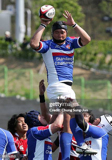 Park Yong-Don of South Korea takes a lineout for the ball during the Rugby Asia 5 Nations & 2011 Rugby World Cup Qualifier between South Korea and...