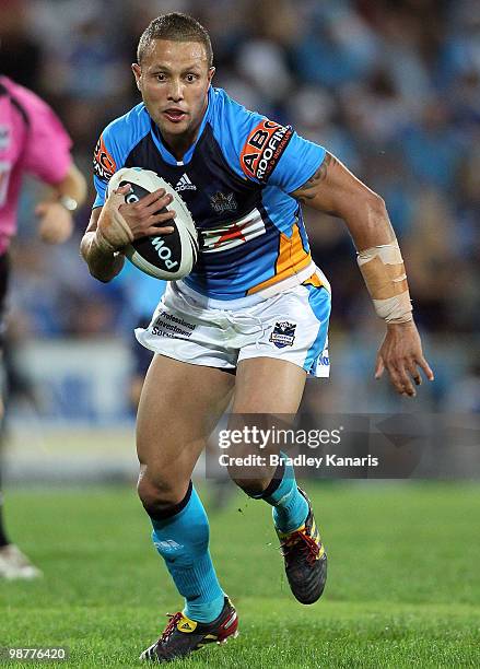Scott Prince of the Titans runs with the ball during the round eight NRL match between the Gold Coast Titans and the Penrith Panthers at Skilled Park...