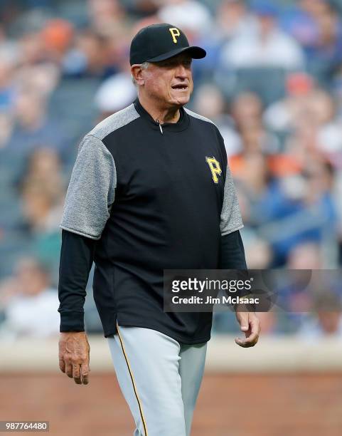 Manager Clint Hurdle of the Pittsburgh Pirates looks on against the New York Mets at Citi Field on June 26, 2018 in the Flushing neighborhood of the...