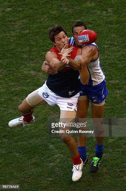 Stefan Martin of the Demons and David Hale of the Kangaroos contest for the ball during the round six AFL match between the North Melbourne Kangaroos...