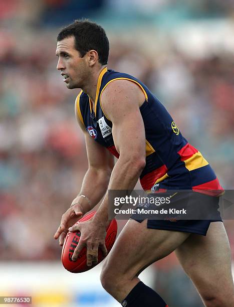 Michael Doughty of the Crows runs with the ball during the round six AFL match between the Adelaide Crows and the Port Adelaide Power at AAMI Stadium...