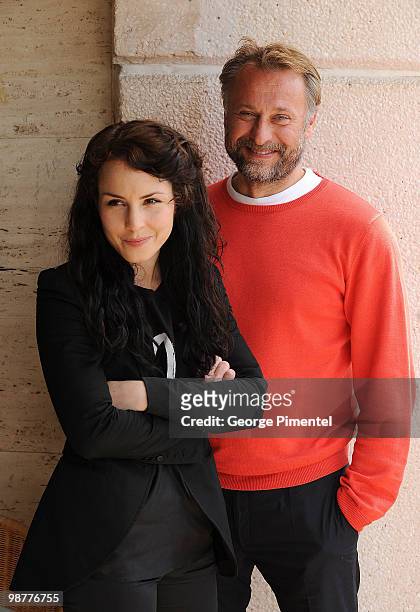 Actors Michael Nyqvist and Noomi Rapace pose during the "The Girl With the Dragon Tattoo" photo call at the Scandinavian Terrace during the 62nd...