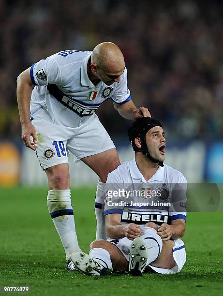 Cristian Chivu of Inter Milan reacts flanked by his teammate Esteban Cambiasso during the UEFA Champions League semi final second leg match between...