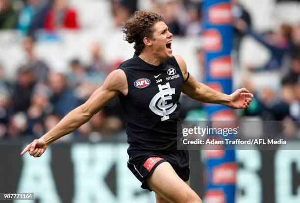 Charlie Curnow of the Blues celebrates a goal during the 2018 AFL round 15 match between the Carlton Blues and the Port Adelaide Power at the...
