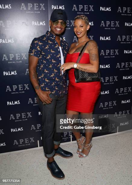 Singer/songwriter Ne-Yo and his wife Crystal Renay attend the release party for his seventh studio album "Good Man" at Apex Social Club at Palms...