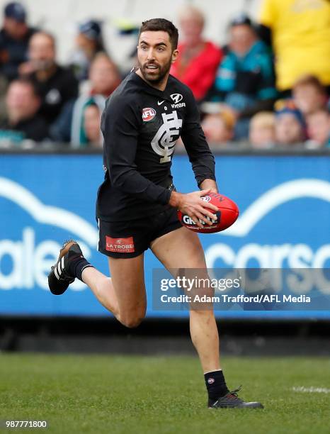 Kade Simpson of the Blues in action in his 300th game during the 2018 AFL round 15 match between the Carlton Blues and the Port Adelaide Power at the...