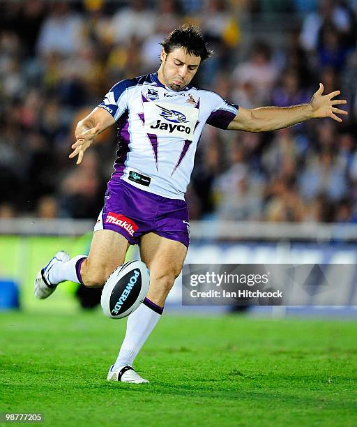 Cooper Cronk of the Storm kicks the ball during the round eight NRL match between the North Queensland Cowboys and the Melbourne Storm at Dairy...