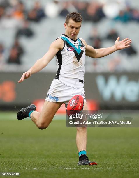 Jack Trengove of the Power kicks the ball during the 2018 AFL round 15 match between the Carlton Blues and the Port Adelaide Power at the Melbourne...