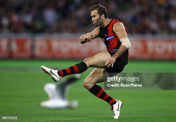 Mark McVeigh of the Bombers kicks during the round six AFL match between the Essendon Bombers and the Hawthorn Hawks at the Melbourne Cricket Ground...