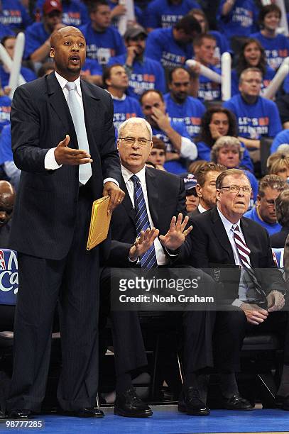 Assistant Coach Brian Shaw, Head Coach Phil Jackson and Assistant Coach Frank Hamblen look on during the game of the Los Angeles Lakers against the...