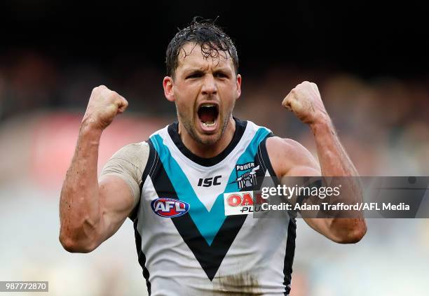 Travis Boak of the Power celebrates a goal during the 2018 AFL round 15 match between the Carlton Blues and the Port Adelaide Power at the Melbourne...