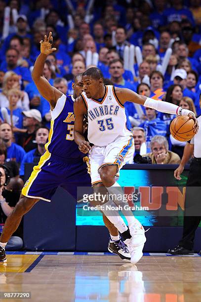 Kevin Durant of the Oklahoma City Thunder works against Ron Artest of the Los Angeles Lakers in Game Six of the Western Conference Quarterfinals...