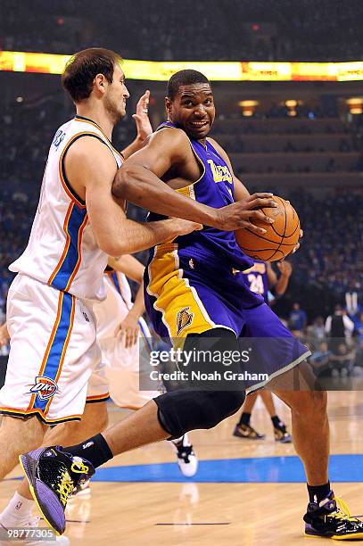 Andrew Bynum of the Los Angeles Lakers tries to get to the hoop against Nenad Krstic of the Oklahoma City Thunder in Game Six of the Western...