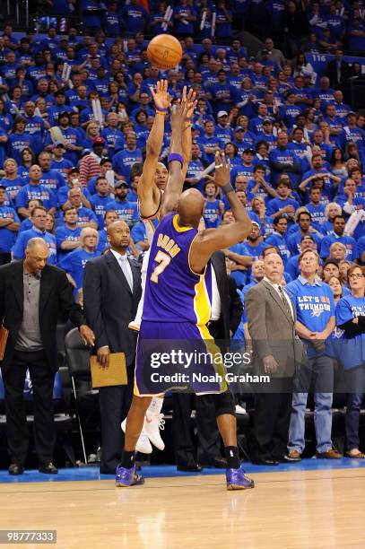 Russell Westbrook of the Oklahoma City Thunder puts up a last second shot that missed against Lamar Odom and the Los Angeles Lakers in Game Six of...