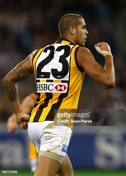 Lance Franklin of the Hawks celebrates after kicking a goal during the round six AFL match between the Essendon Bombers and the Hawthorn Hawks at the...