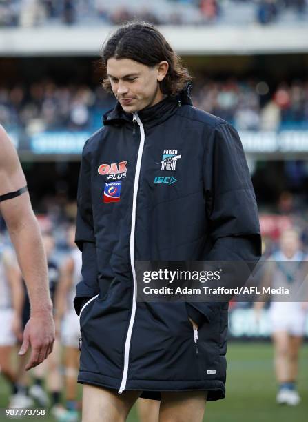 Jasper Pittard of the Power is seen injured during the 2018 AFL round 15 match between the Carlton Blues and the Port Adelaide Power at the Melbourne...